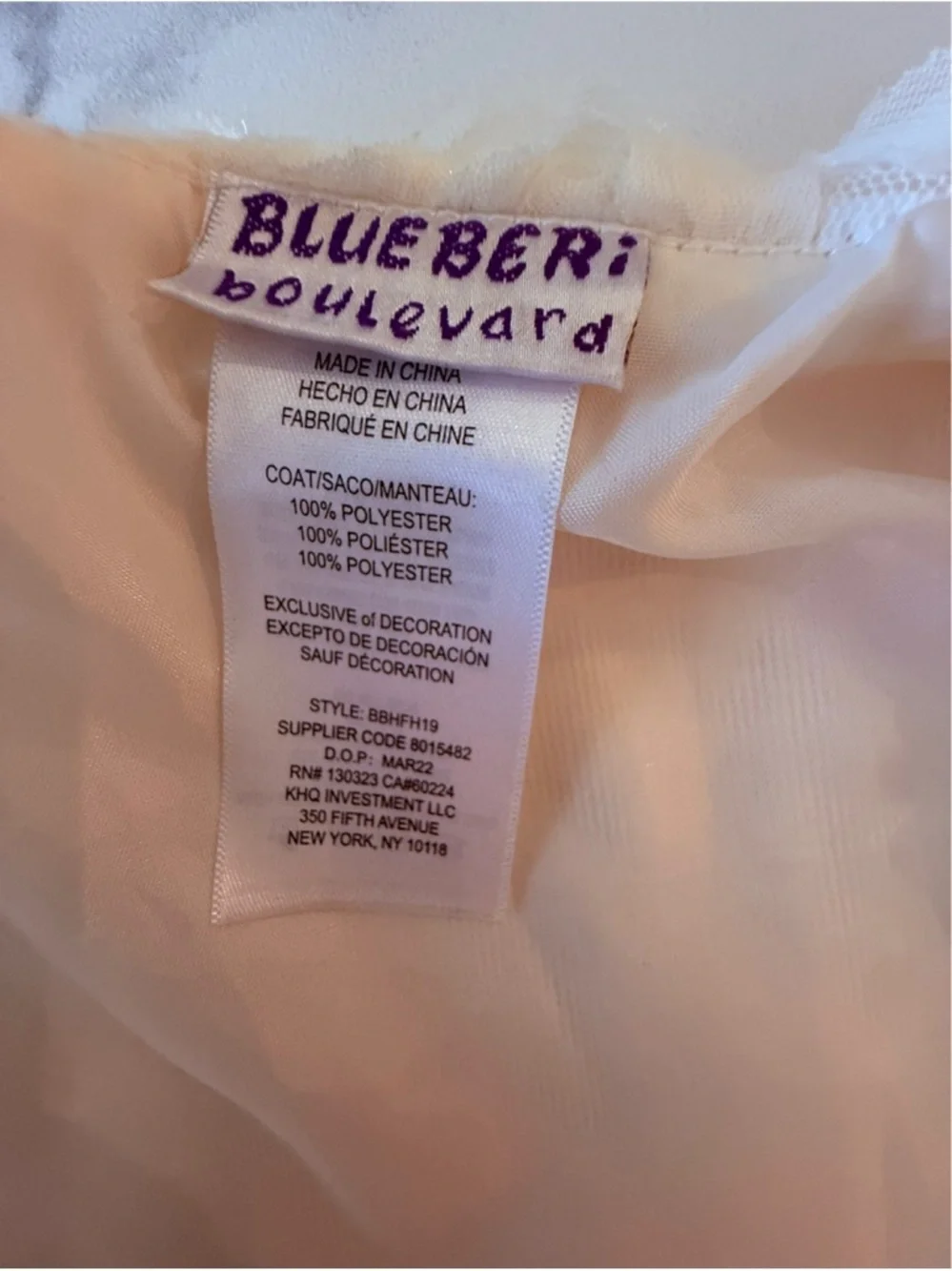 Blueberi Boulevard girl's ivory textured faux-fur coat.